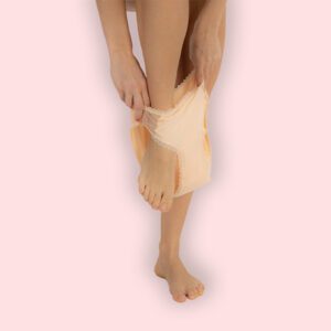 a person putting on a pair of underwear