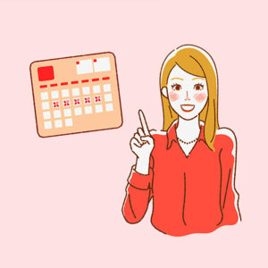 a woman pointing at a calendar