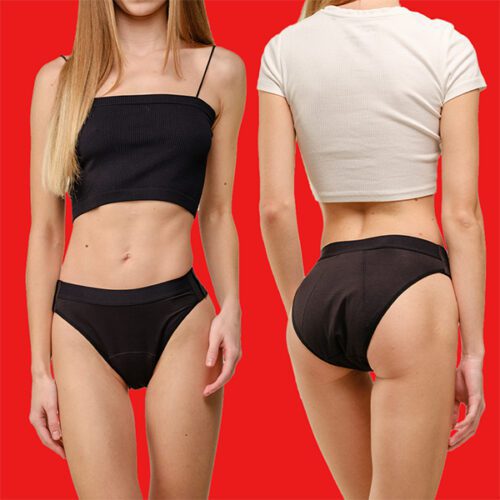 a woman wearing black and white underwear