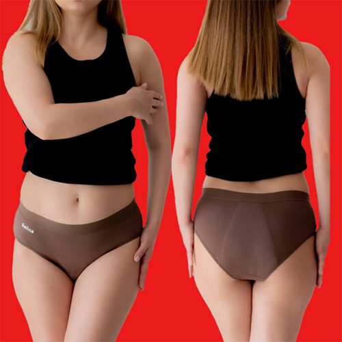 a woman in underwear and tank top